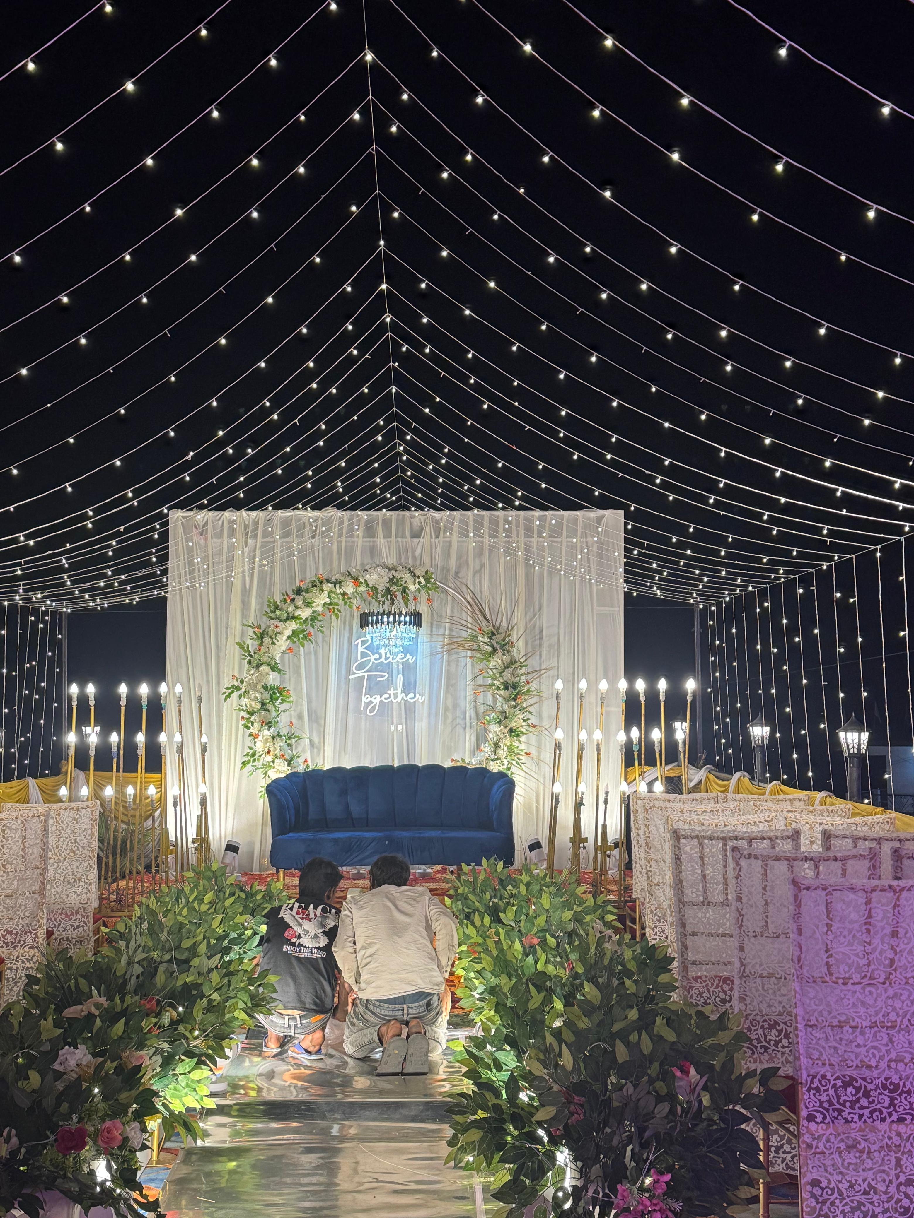 Wedding fairy light canopy and floral arch